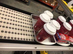no spill coffee - beverage conveyor