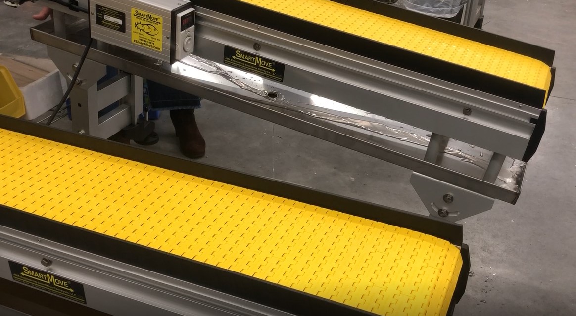 Accumulation Conveyor system sliding stop plate – drip pan