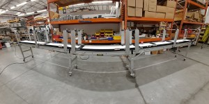 Long Line Assembly Conveyor with Adjustable Lane Dividers and overhead gantry for packaging