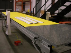 short line custom designed conveyor with work surface