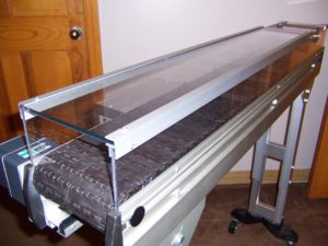 clean hood conveyor enclosure - prevents dust