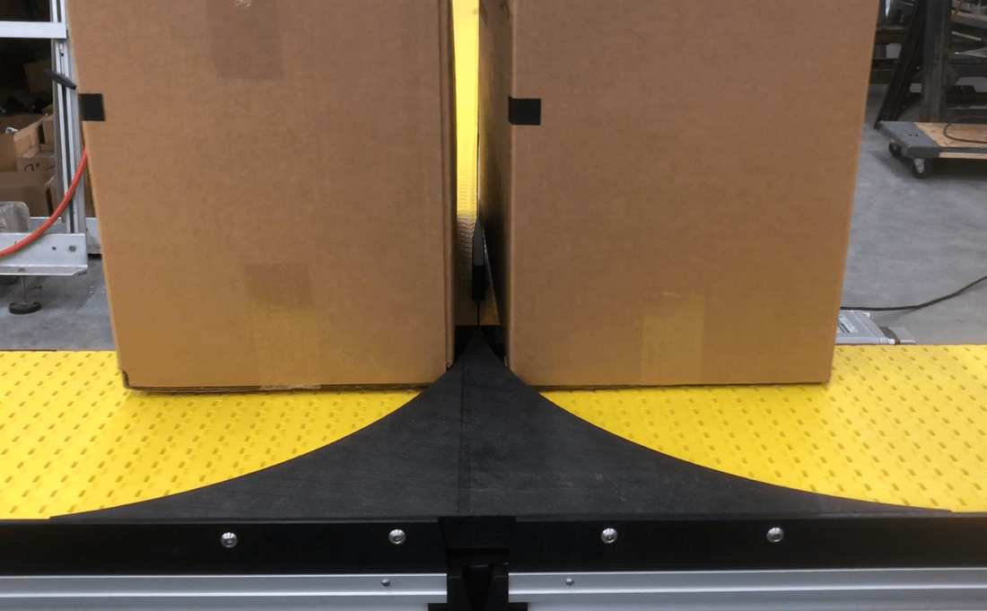 diversion conveyor for dual lane separation