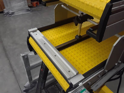 robotic conveyor lane separator end stop