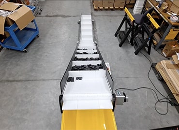 incline parts packaging conveyor thumb