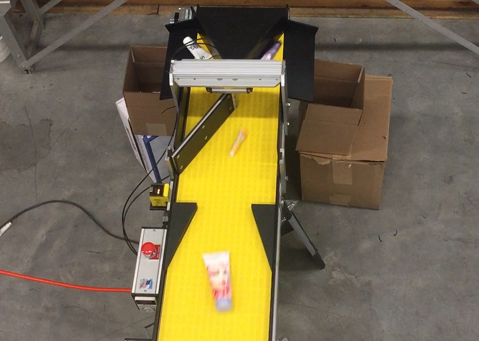 lane diverter conveyor with flip arm for sorting and counting for packaging